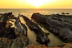 夕映えの海