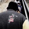 薔薇に包まれた男