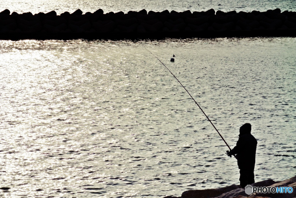 釣人。