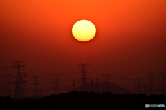 沈みゆく太陽と鉄塔