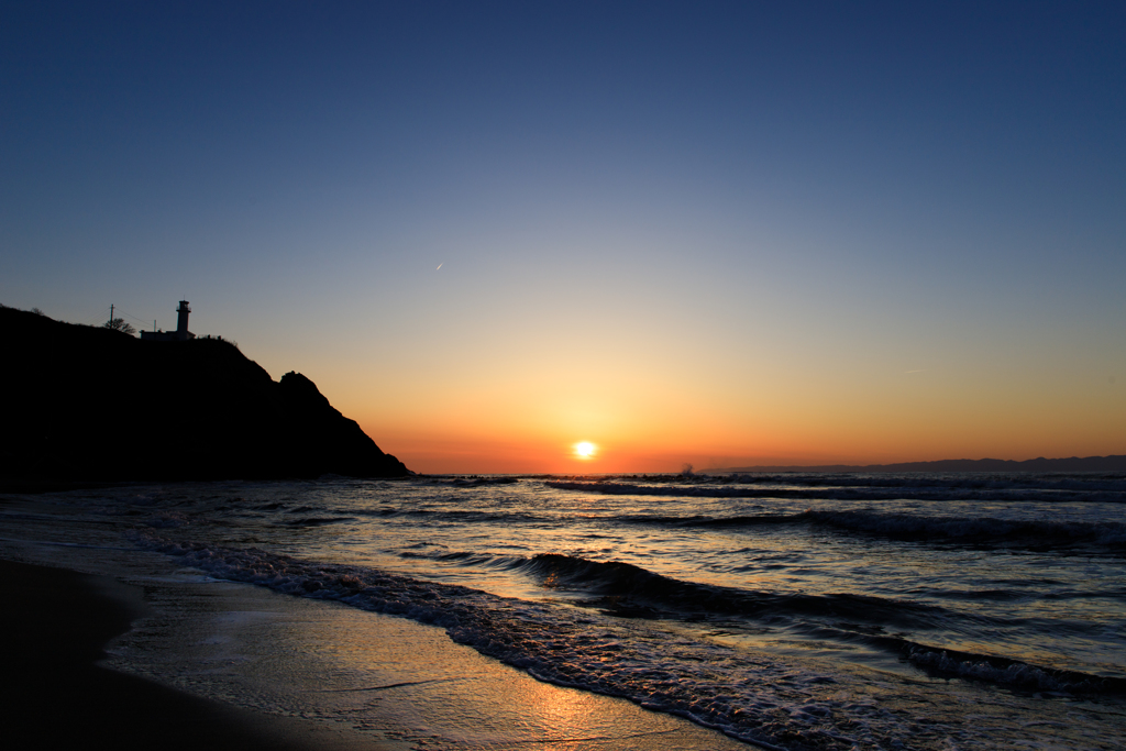 夕日と灯台