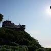 逆光の弥彦山パノラマタワー