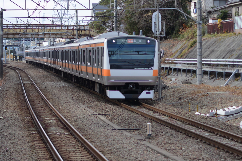 「快速　東京行き」