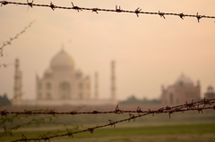 Taj Mahal through barbed wire 