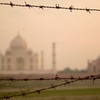 Taj Mahal through barbed wire 