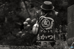 お釜の帽子の男