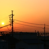 工場と夕日