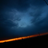 夕焼けを覆う雲