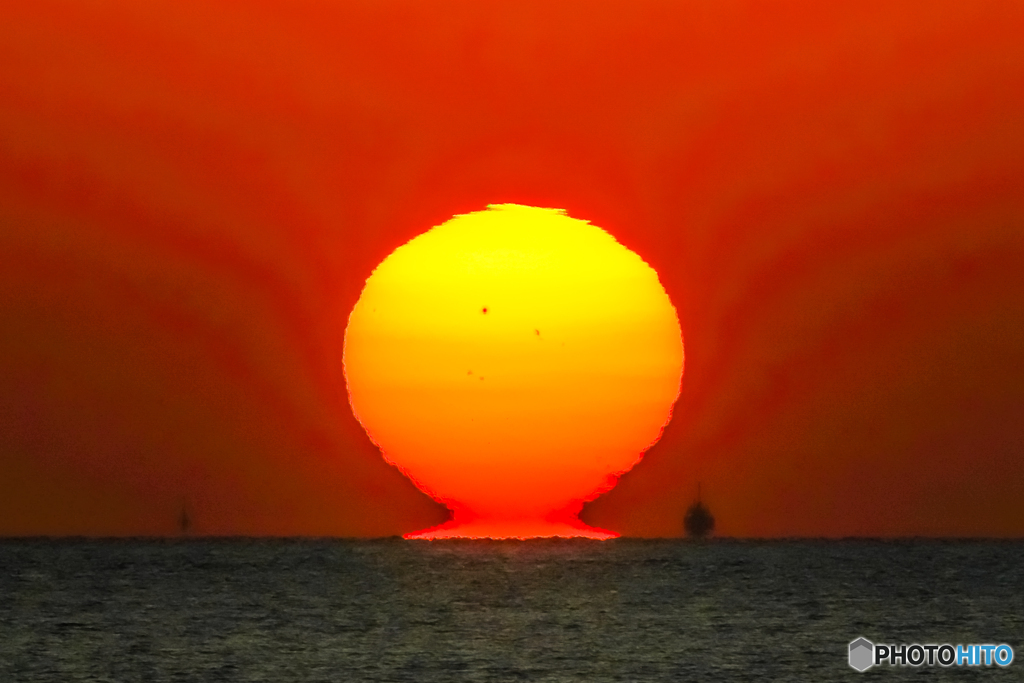 彩る達磨夕日