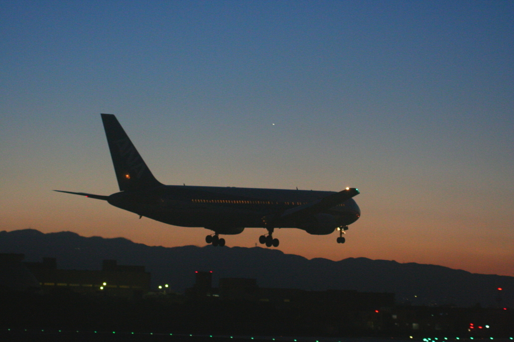 夕景の翼