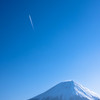 高く