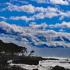 空は穏やか 海は時化