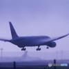 成田着