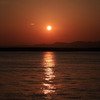 沈む陽に