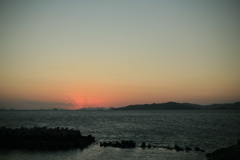 ぼちぼちだるま夕日だな