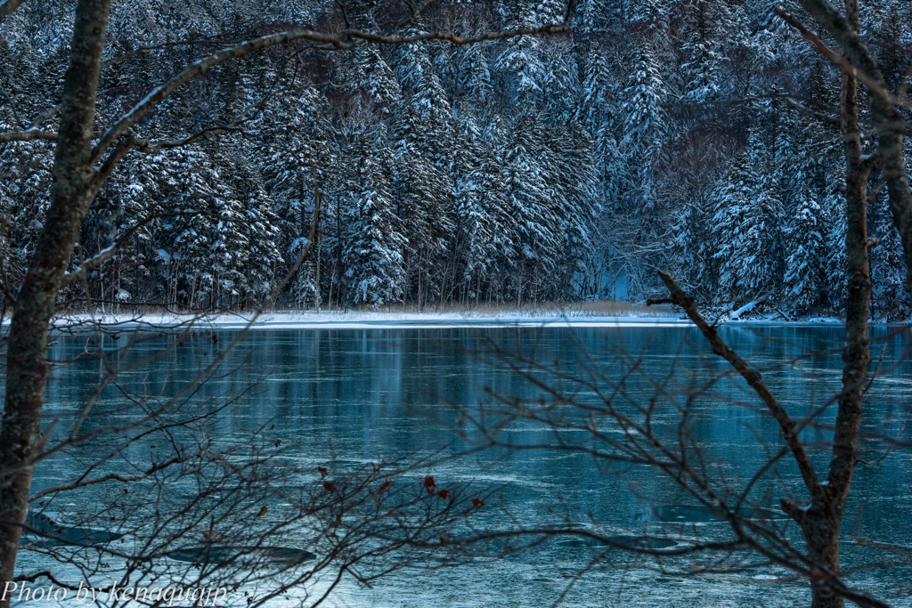 Blue beautiful thin ice of the lake