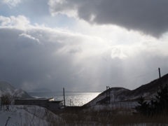 雲から溢れる陽