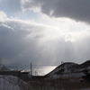 雲から溢れる陽