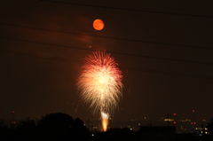 赤い月と花火