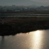 遠賀川に映える朝日