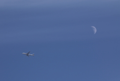 Blue moon with blue plane