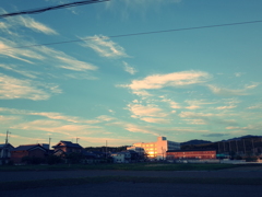 窓に映る夕日