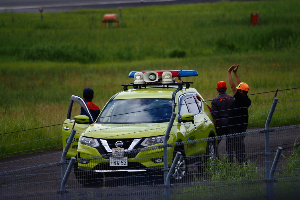 見送る車