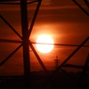 鉄塔越しの夕陽