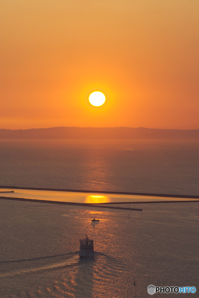 夕日に
