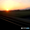 車窓の夕日