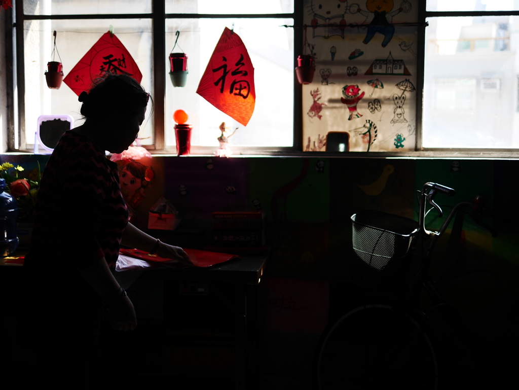 市場に住む張さん