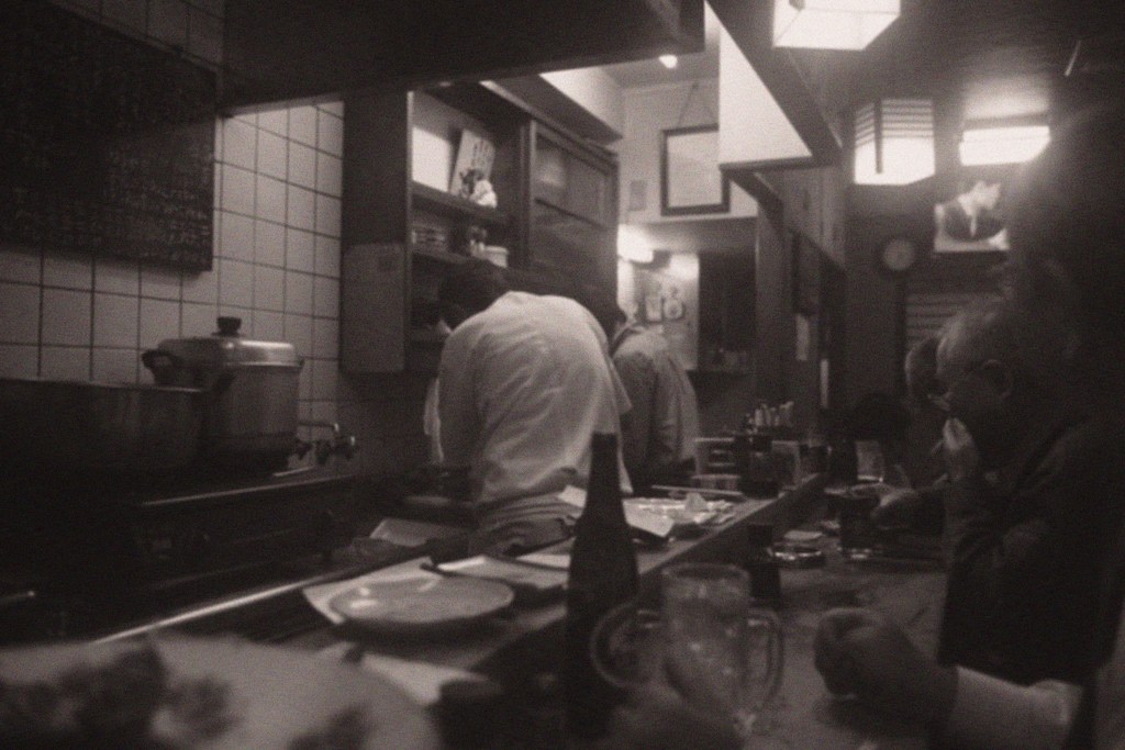 背中に語る常連さん