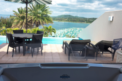 Beyond the jetted bath is a terrace