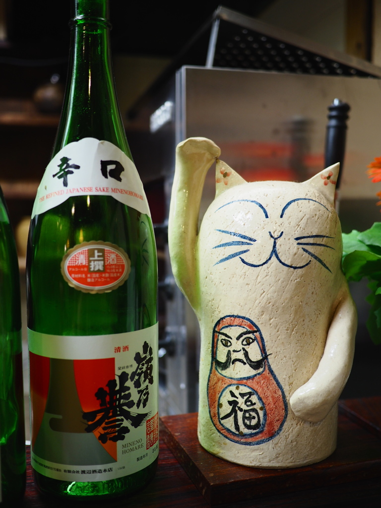 マ