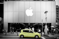 Apple and yellow car