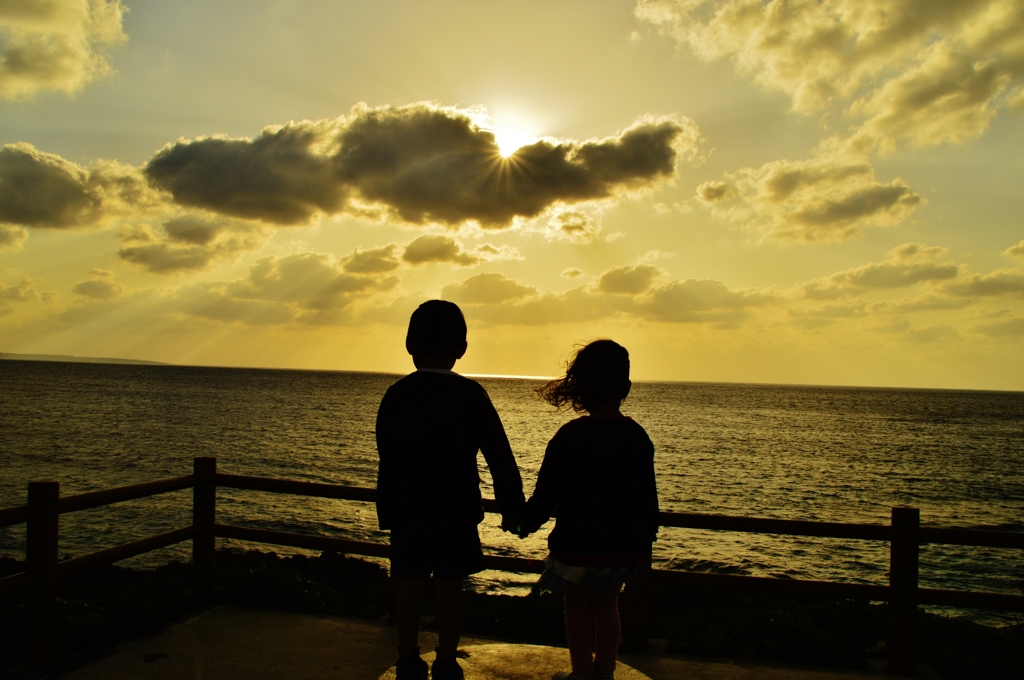 Sunset as seen by two people