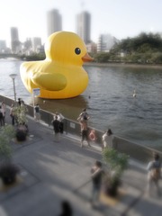 A real duck and miniature crowd