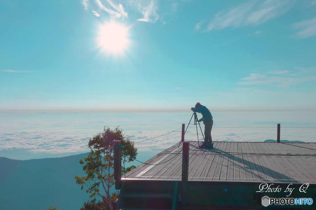 雲海の上のカメラマン