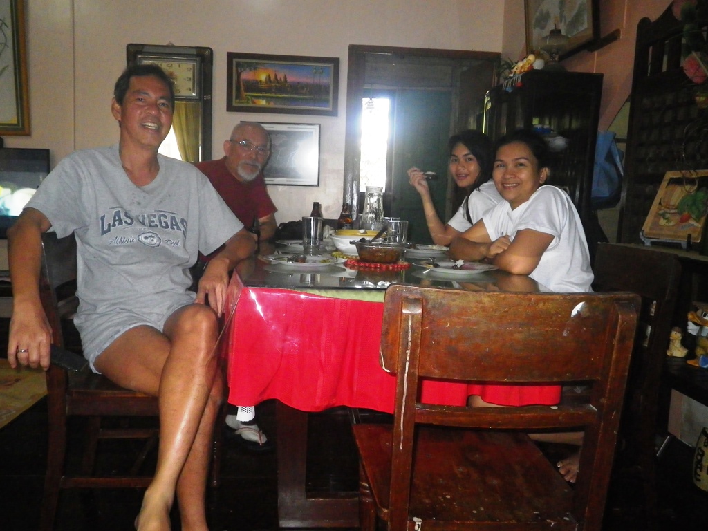Mr Mo Singson, his wife and daughter