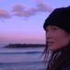 旅館の前の浜辺にて