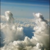 真っ白な雲に見せられて(機内より)