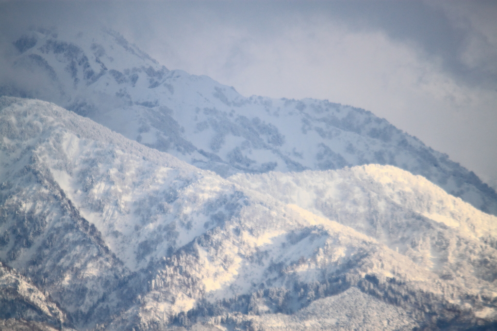 雪の立山連峰　剱岳視界不良