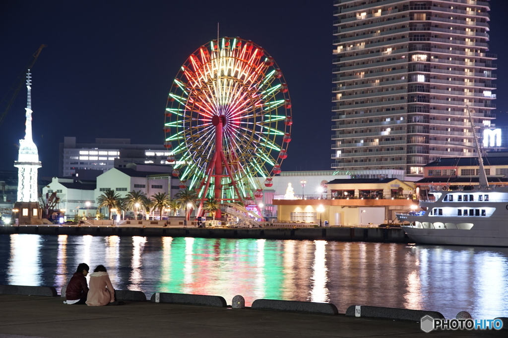 神戸の夜景と二人の男女