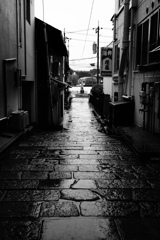 雨の中を消えて