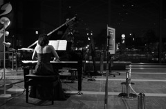 A woman playing the piano
