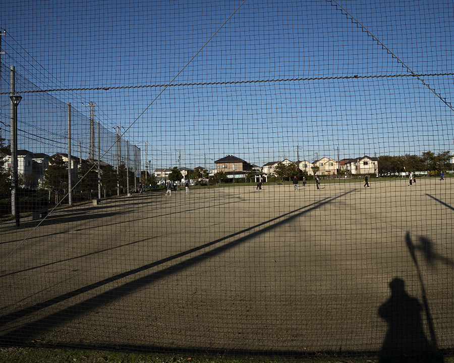 早朝ソフトをする人.