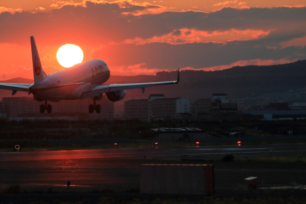 夕日を背負って