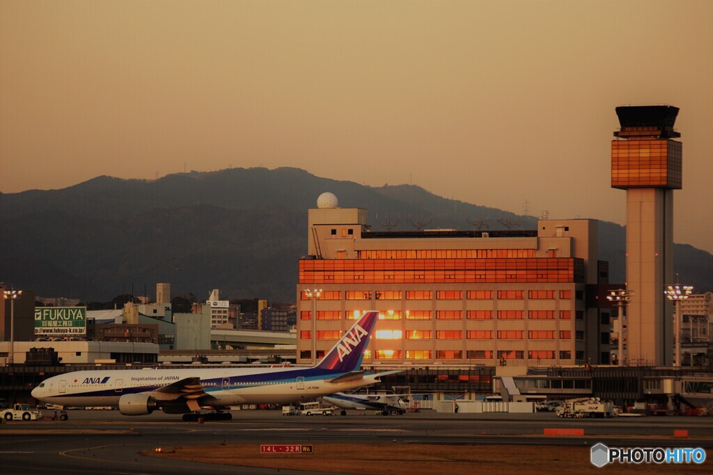 トリプルと沈む大きな夕日