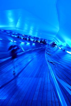 jogger at blue corridor