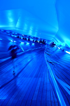 jogger at blue corridor